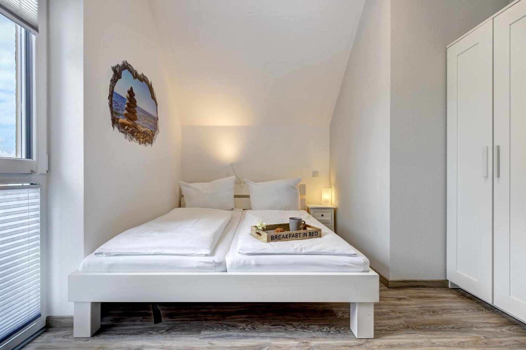 Haus Strandkoerv Mit Fass-Sauna Loddin Buitenkant foto